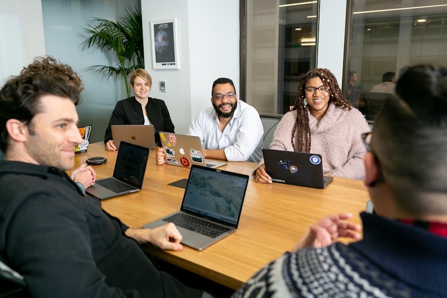 The Hope in Action team meeting around a conference table