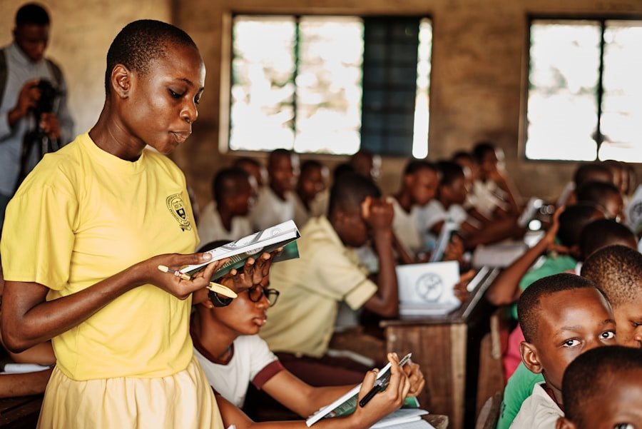 A student reading in a classroom supported by our education programs